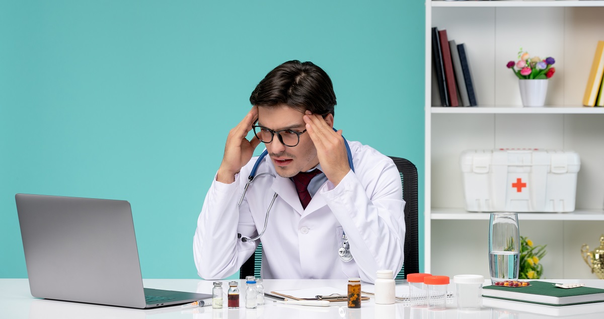 Doctor working remotely representing Stress and Mental Wellness in 2025